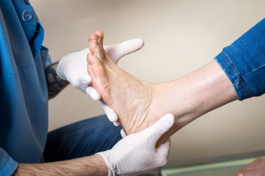 The,Hands,Of,A,Young,Man,Doctor,Orthopedist,Conducts,Diagnostics,