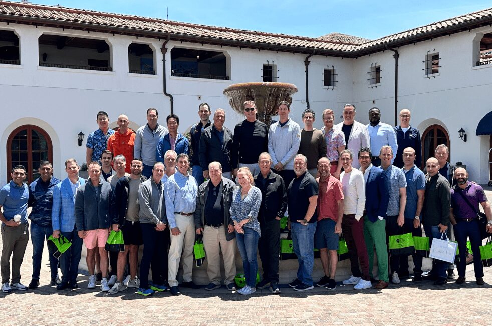 Group shot of SCOI’s team of orthopedic surgeons outdoors in front of a large fountain.